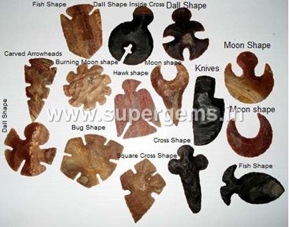 Picture of carved arrowhead pendants in chart