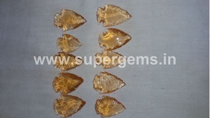 Picture of golden obsidian glass arrowheads