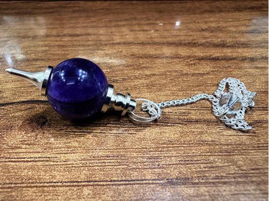 Picture of amethyst ball pendulums